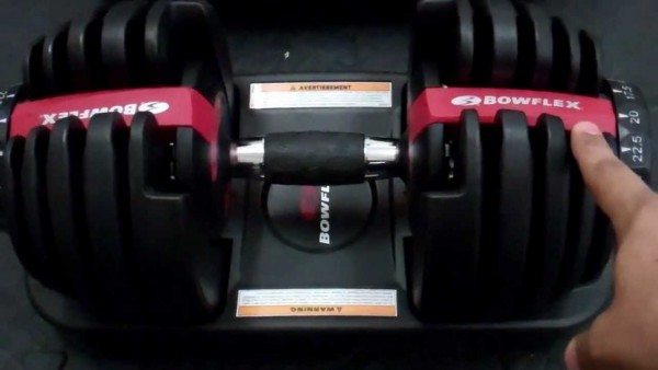 Home workout with adjustable dumbbells